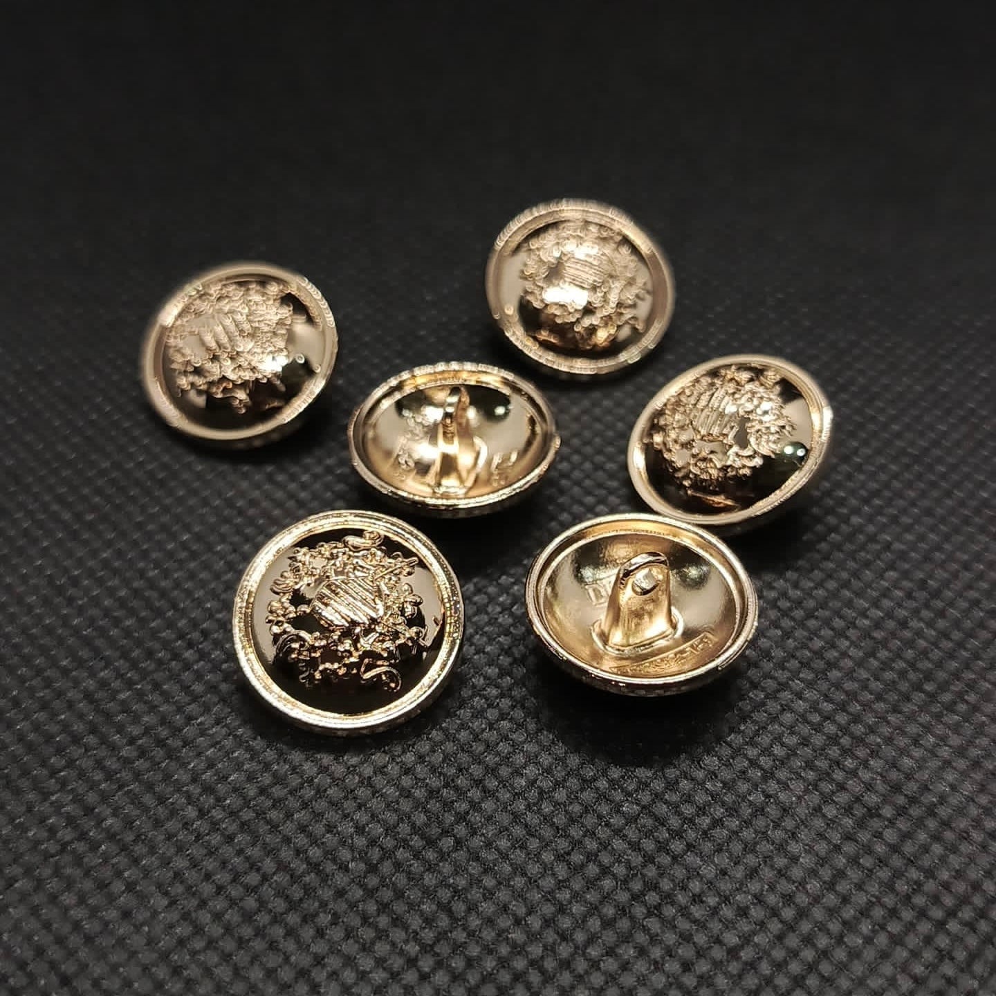 Ornate Arms Design Metal Buttons