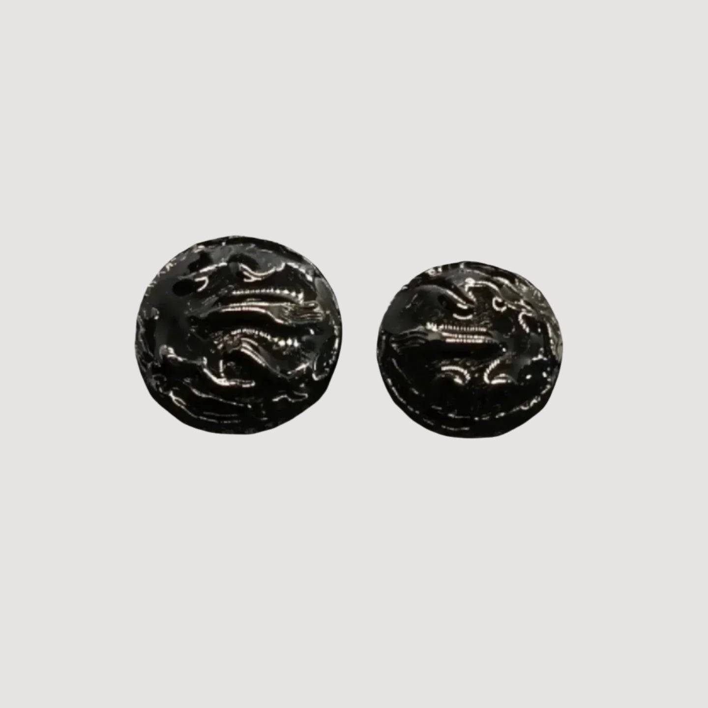 Ornate Dark Colored Metal Buttons