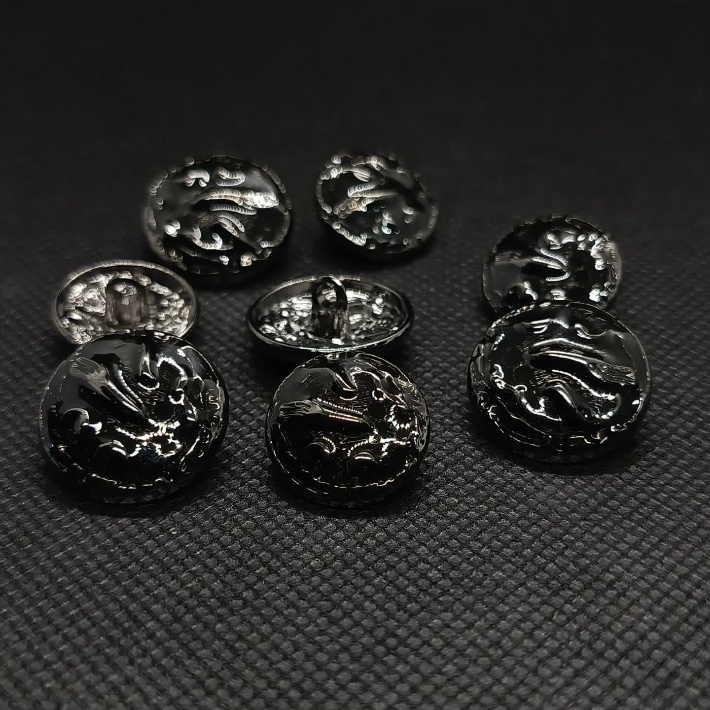 Ornate Dark Colored Metal Buttons