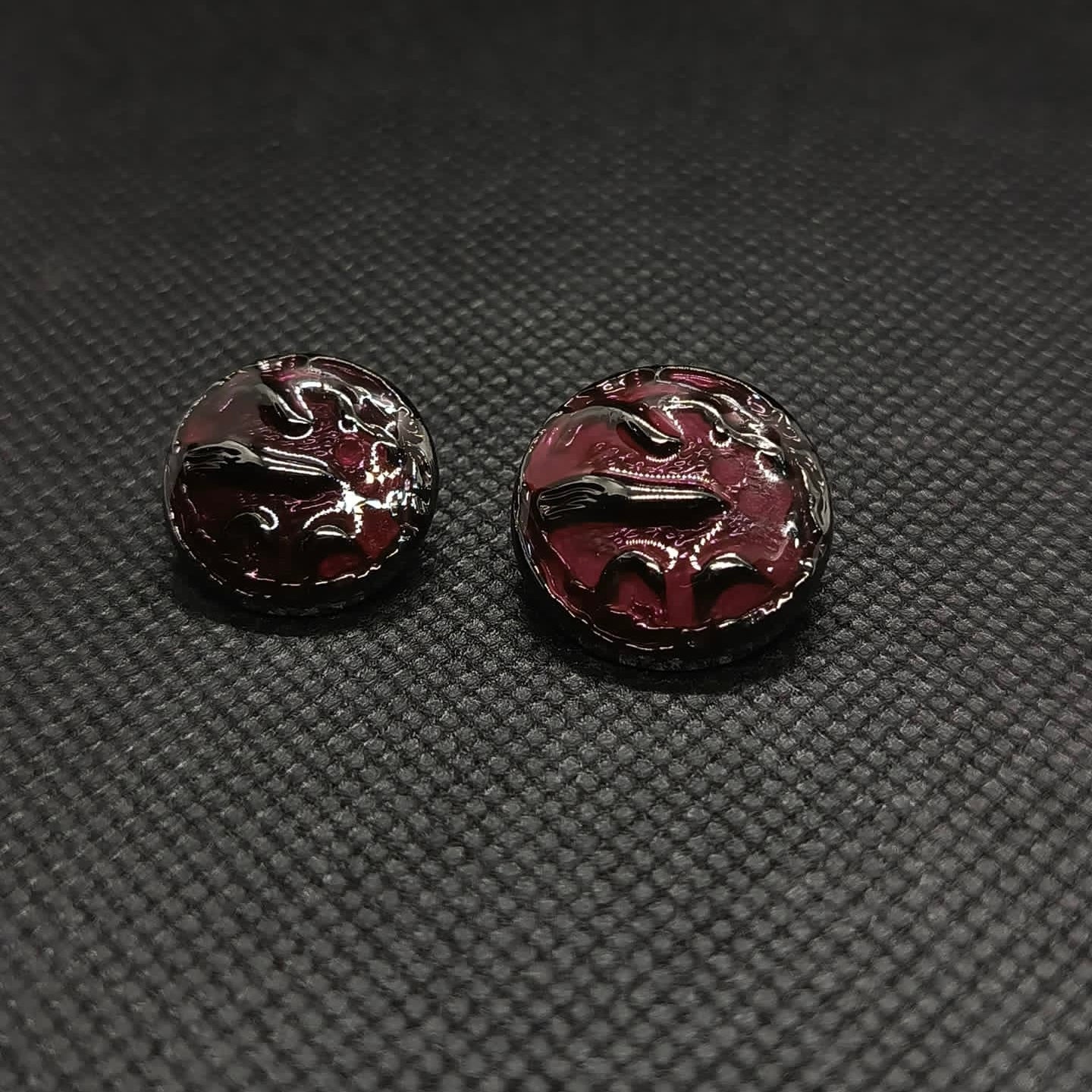 Ornate Dark Colored Metal Buttons
