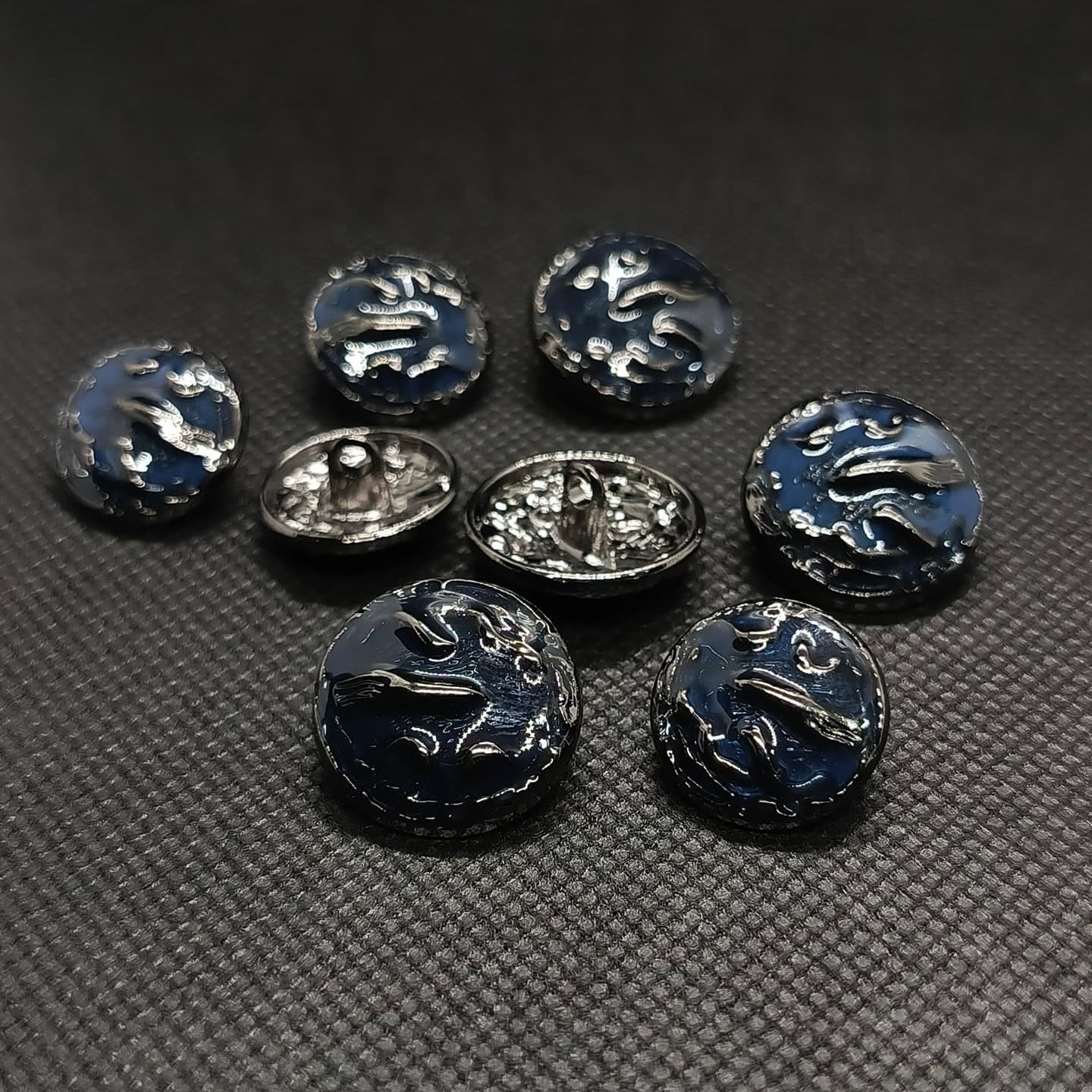 Ornate Dark Colored Metal Buttons