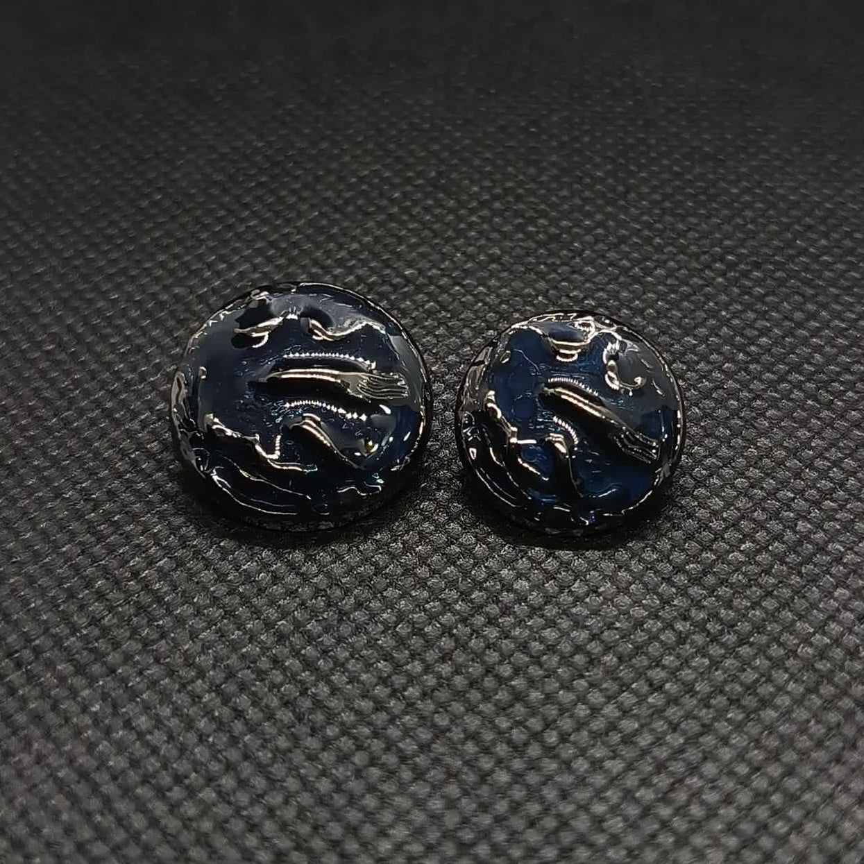 Ornate Dark Colored Metal Buttons
