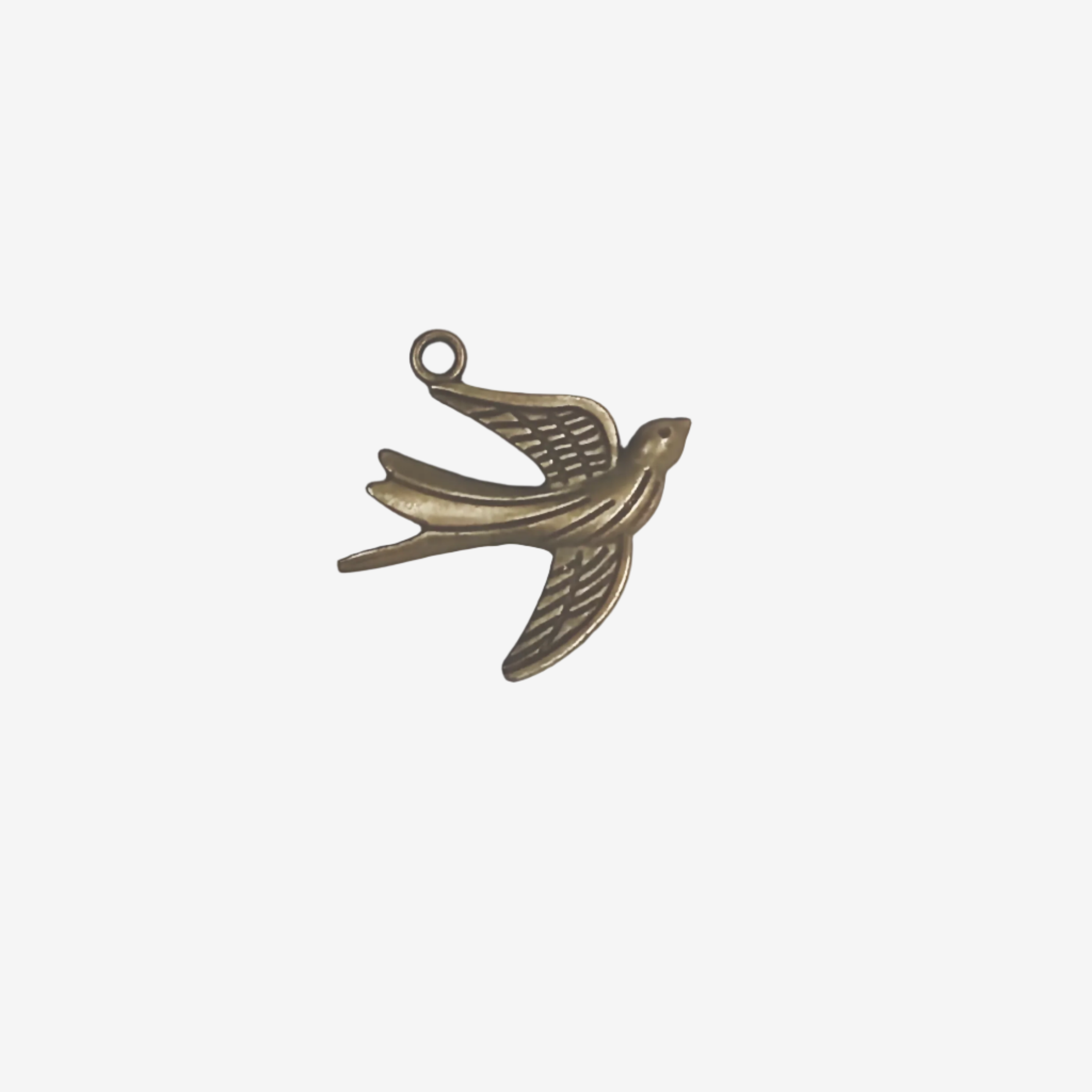 The Soaring Swallow Charm