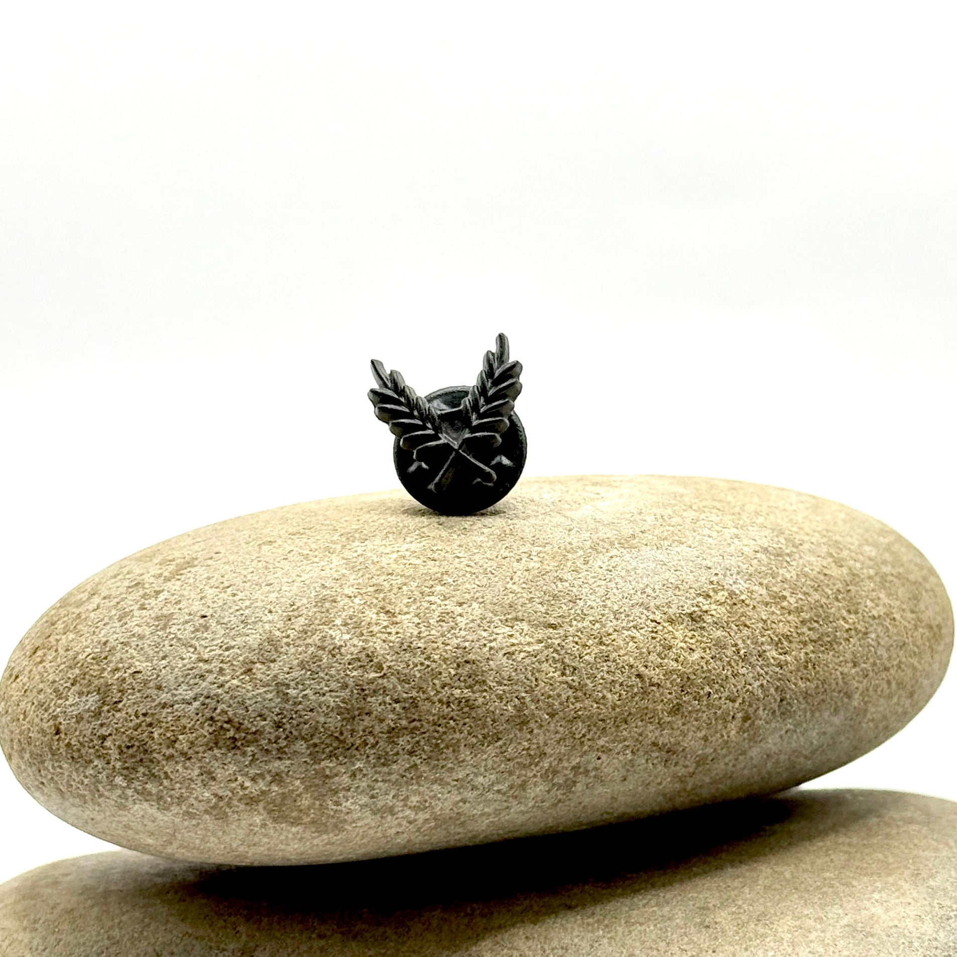 Gilded Triumph Lapel Pin