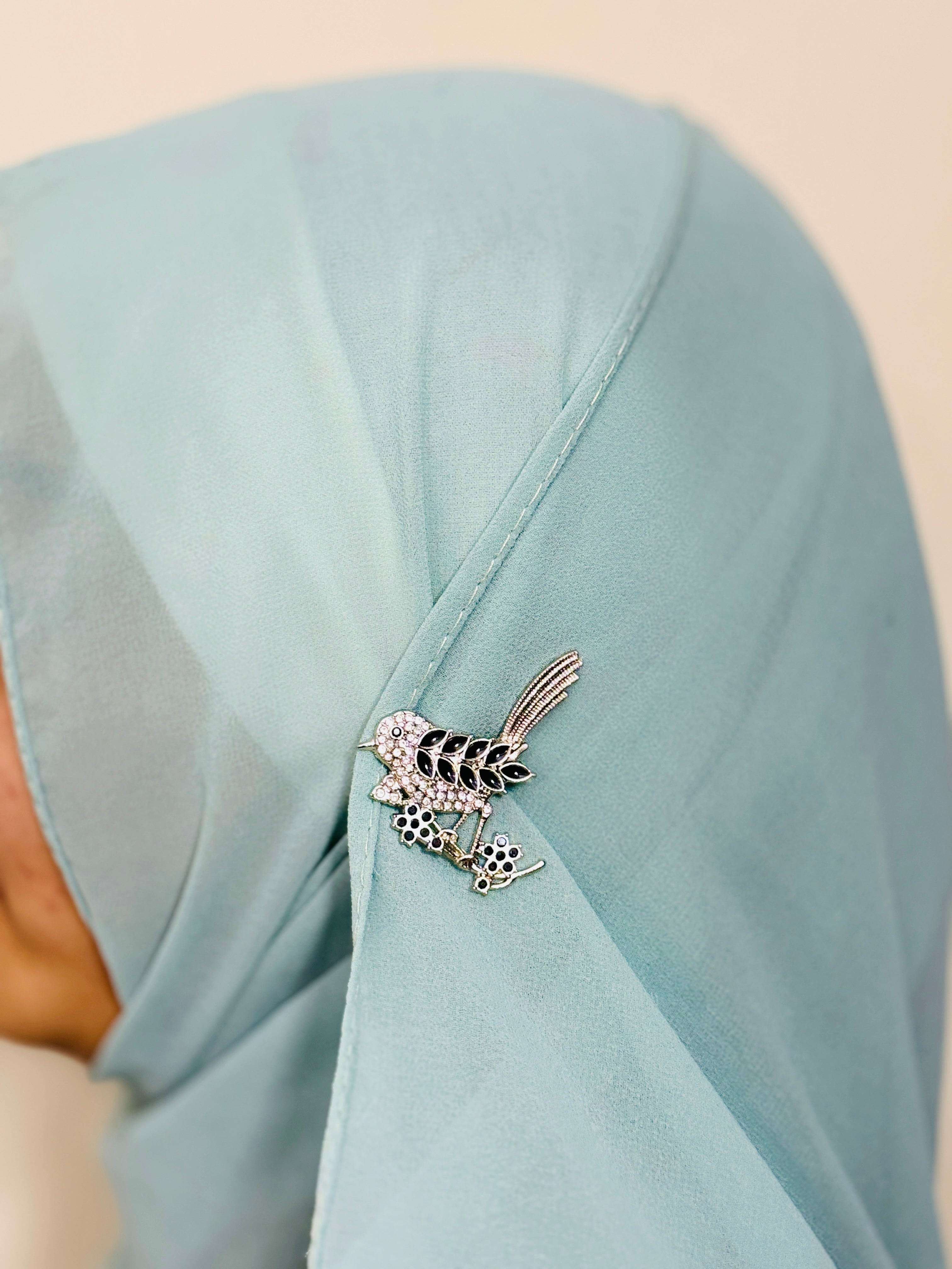 Elegant Black Feather Bird Pin