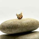 Gilded Triumph Lapel Pin