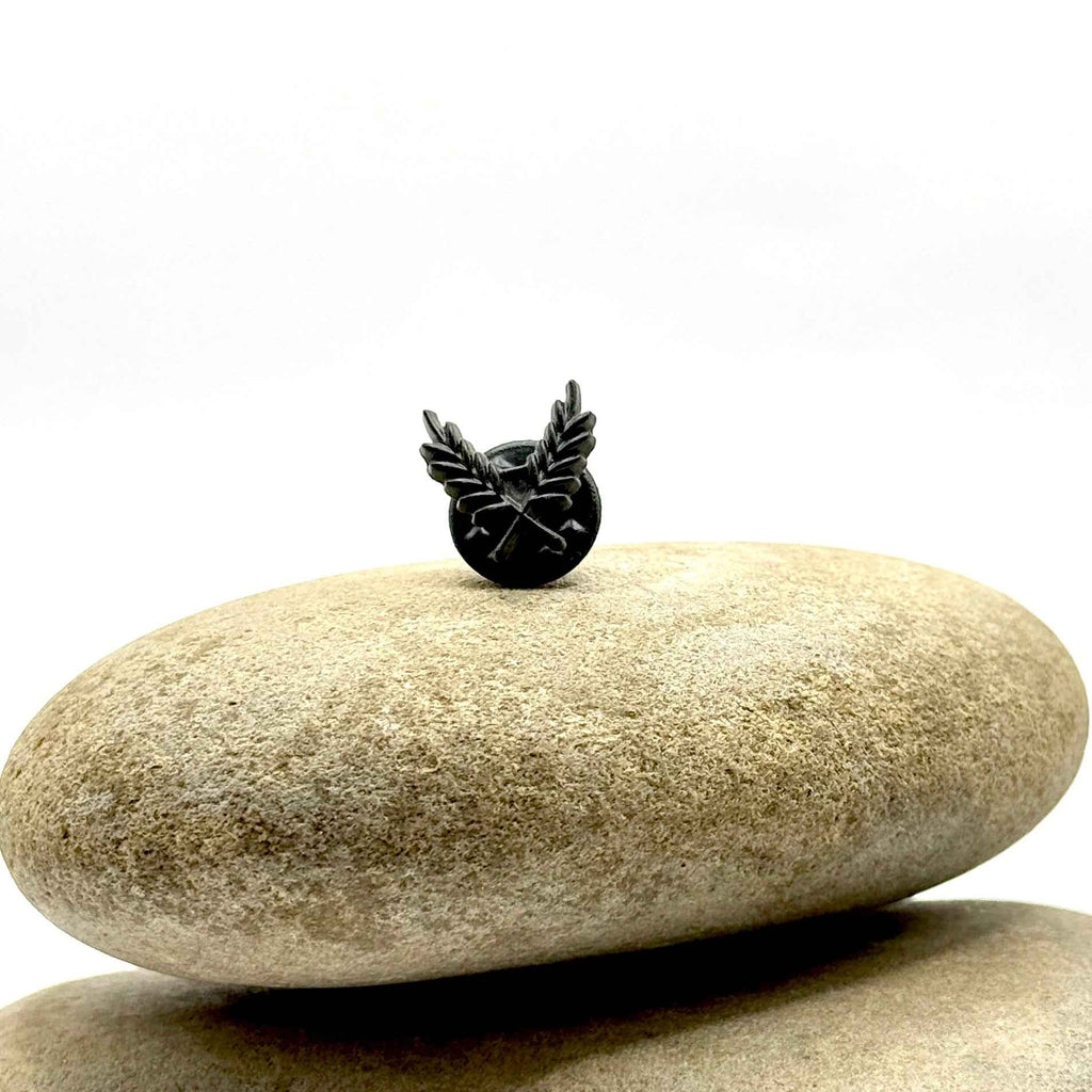 Gilded Triumph Lapel Pin